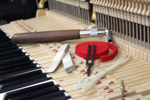 chỉnh đàn piano cơ